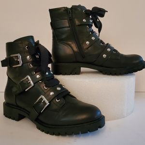 Black, buckled, combat boot.